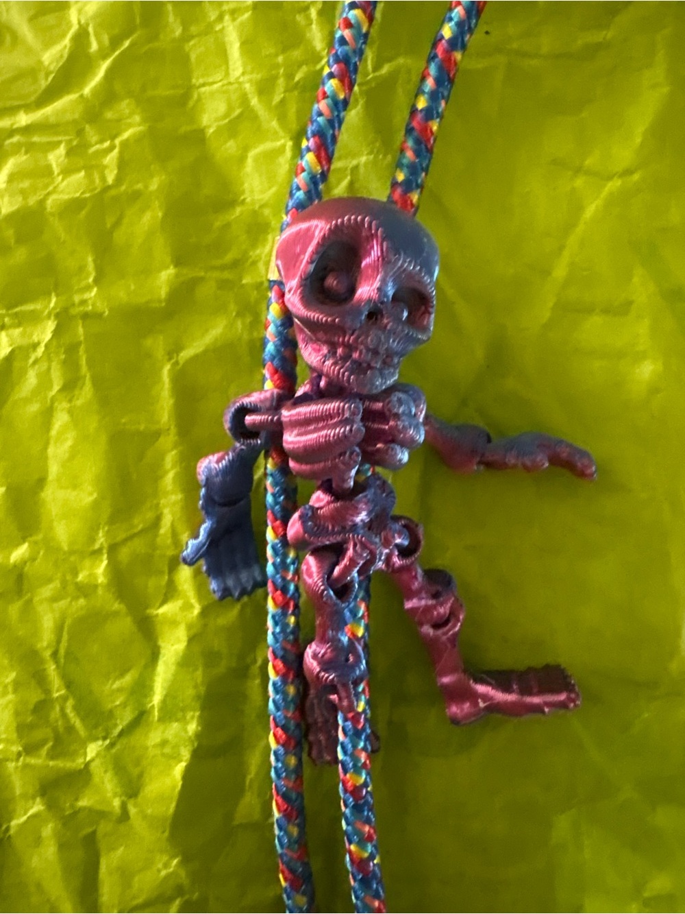 Colorful Pink & Blue Skeleton Climbing Toy Bolo Tie